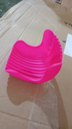 Child enjoying a burger without mess, thanks to the silicone burger holder.