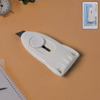 Mini Cloud Box Cutter showing sharp stainless steel blade