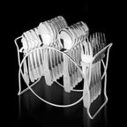 24-piece stainless steel cutlery set with elegant storage stand on table