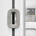 White fridge freezer door lock latch installed on refrigerator door for baby safety