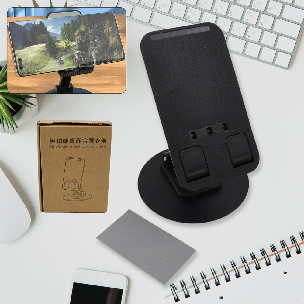 A sleek black rotating mobile stand, folded compactly on a desk, ready for use.