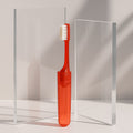 Foldable toothbrush with built-in travel case for hygiene on the go.