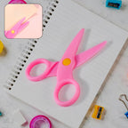 Set of colourful child-safe plastic scissors for toddlers learning to cut.