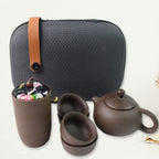 Elegant purple sand ceramic teapot & matching tea cups for authentic brewing