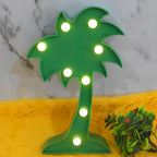 The Coconut Tree LED Lamp placed on a table, creating a romantic atmosphere in a home setting.