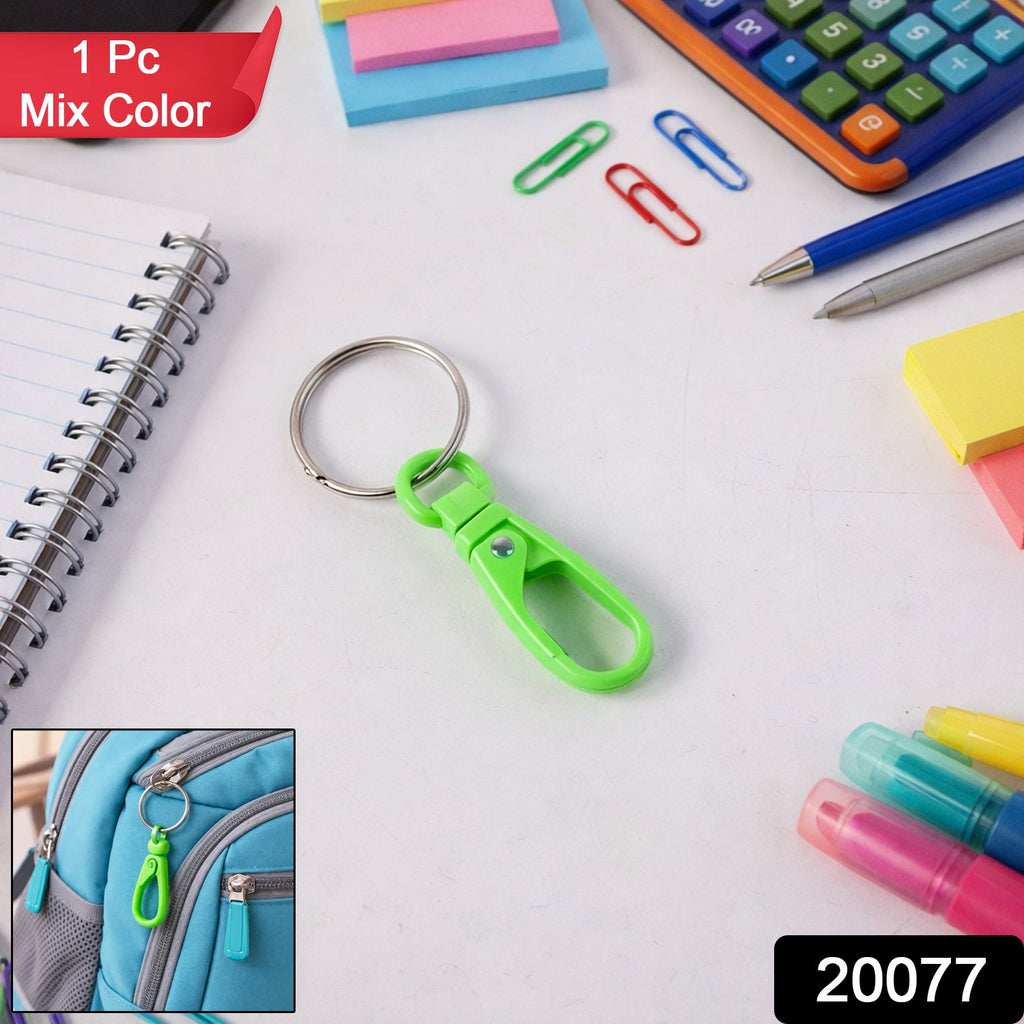 Vibrant mini plastic carabiner keychain with metal ring holding keys.