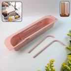 Expandable sink caddy with dual towel bars and built-in drip tray over kitchen sink
