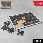 Close-up of wooden solar system puzzle pieces showing interlocking planets