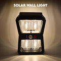 Solar Wall Lantern with motion sensor illuminating an outdoor space at dusk.