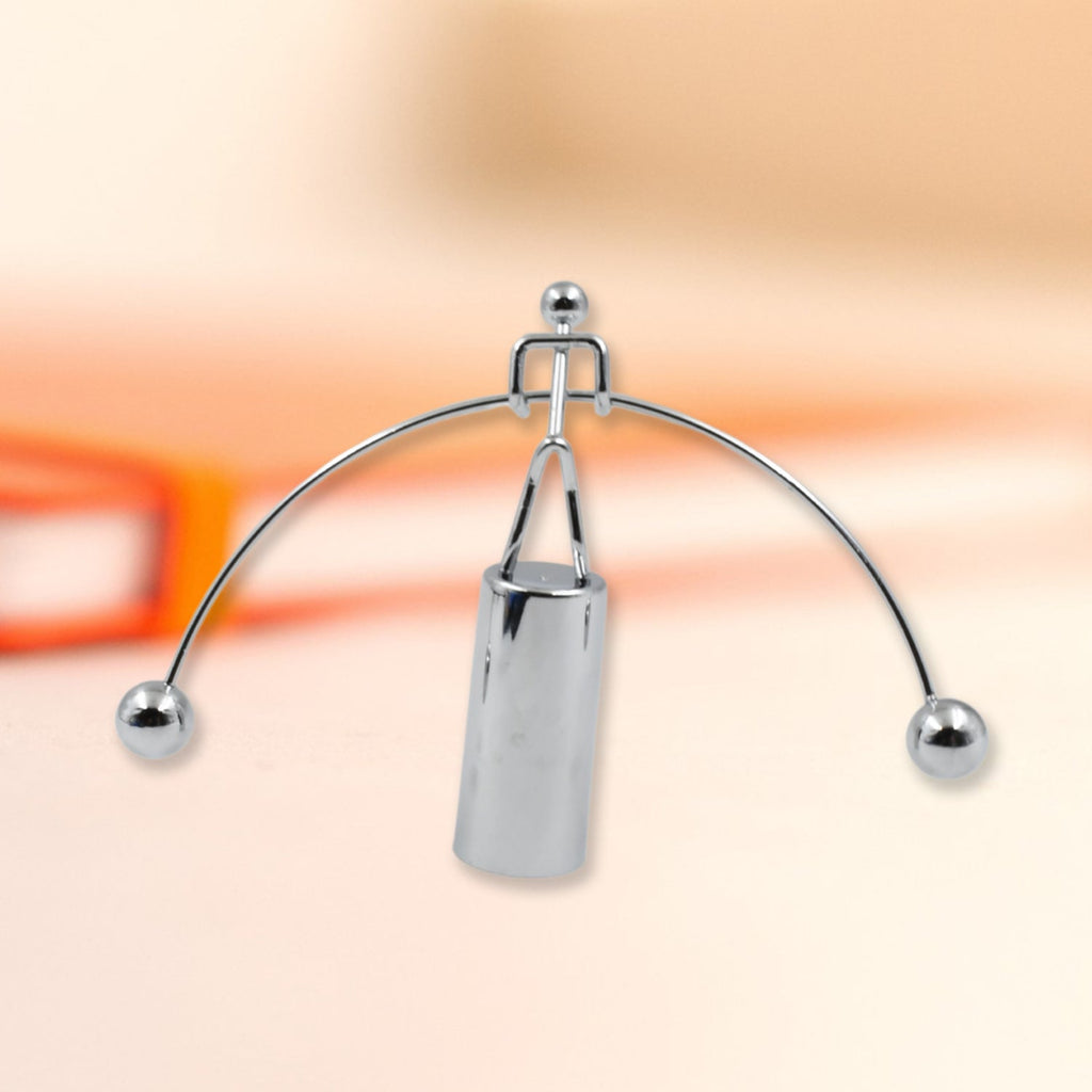 Elegant metal balance desk toy, a classic physics demonstration piece.