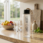Reusable frosted glass bottle with easy-to-clean design