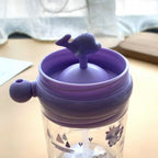 The Whale Spray Sippy Cup displayed in its colourful retail packaging, ideal for gifting.