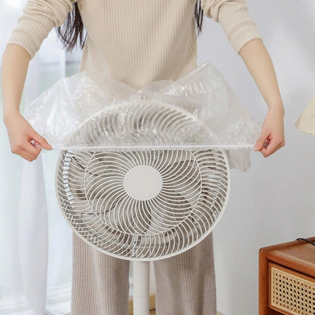 Individual plastic covers protecting dining chairs from dust.