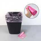 Roll of leak-proof garbage bags in multiple colors for mess-free disposal