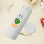 Close-up of the eco-friendly borosilicate glass water bottle, highlighting its clear material and stylish design.