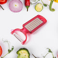 2-in-1 kitchen peeler and grater peeling a carrot effortlessly with stainless steel blades