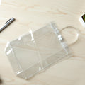 Transparent PVC carry bag 22 x 16 cm showing handle and button closure
