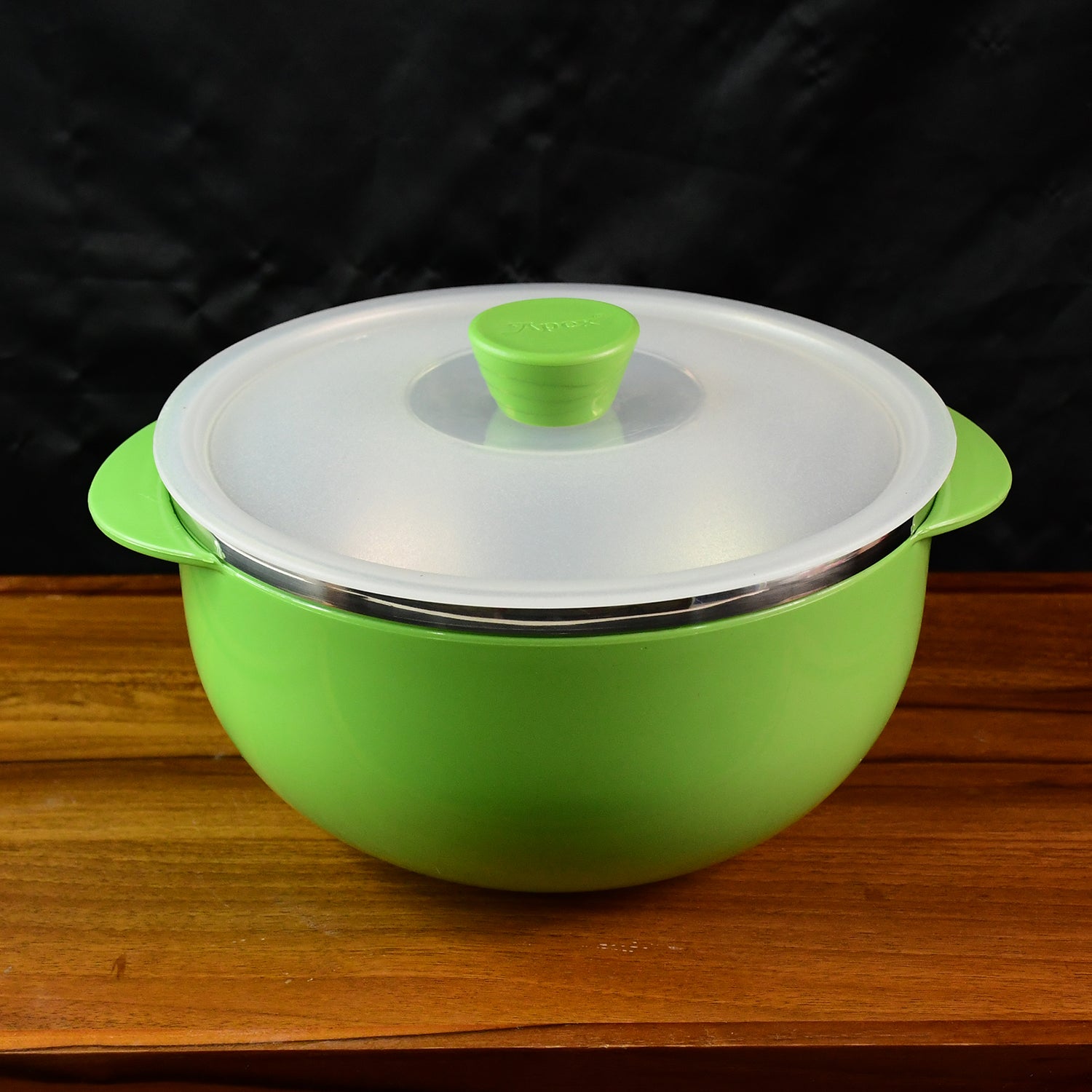 Ergonomic serving bowl with side handles and vented plastic lid