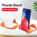 Hand shape mobile stand holding smartphone on desk