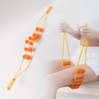 Person using the back massage roller rope on their shoulder for relief