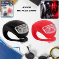 RaceVault Bike Light Set featuring a bright LED headlight mounted on a bicycle handlebar.