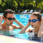 Close-up of swimming goggles showcasing adjustable fit and silicone eye seals