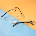 Close-up image of rimless reading glasses showcasing lightweight design and clear lenses