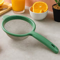 Large kitchen strainer with fine stainless-steel mesh shown on white background