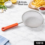 Fine mesh kitchen strainer in use filtering food ingredients