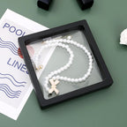 Clear floating jewellery display case with magnetic lock