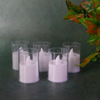 Close-up of a flameless LED votive candle with gentle flicker effect