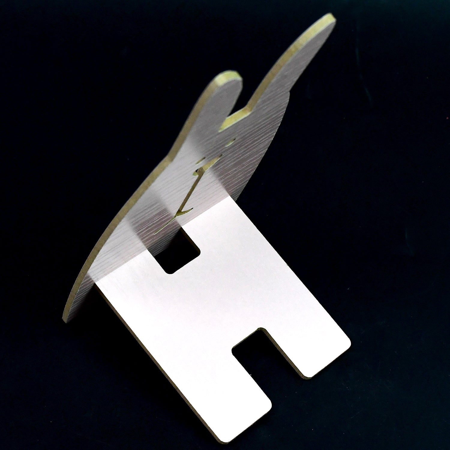 Close-up of the wooden rabbit mobile stand's detail and craftsmanship.