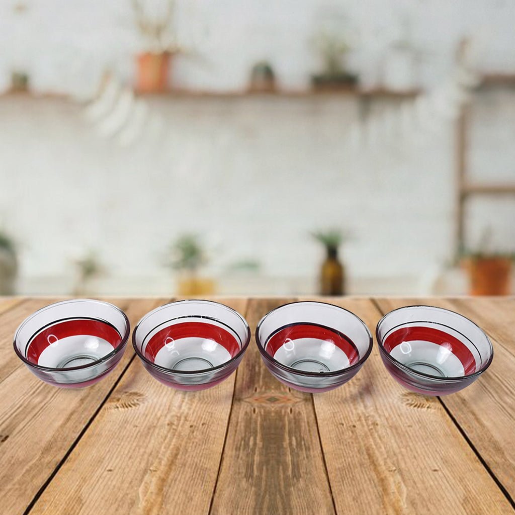 Side view of ceramic cup and glass bowl set arranged neatly