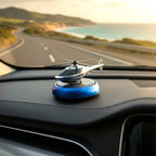 Decorative helicopter fragrance diffuser placed on car dashboard
