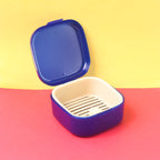 Oblivion storage box featuring a removable draining tray for moisture control