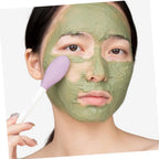 Side view of the versatile silicone mask brush, showcasing its compact design.