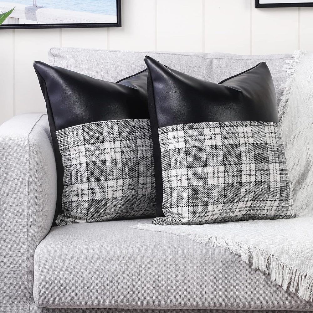 Lifestyle image of the Leather & Cotton Pillow Covers enhancing a modern living room sofa.