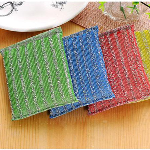A hand holding a scratch-proof scrubber pad, demonstrating its flexibility.