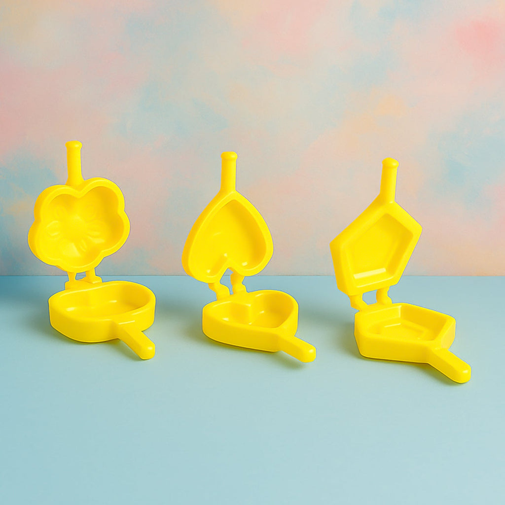 Plastic cookie cutters arranged neatly on a kitchen counter for easy biscuit making.