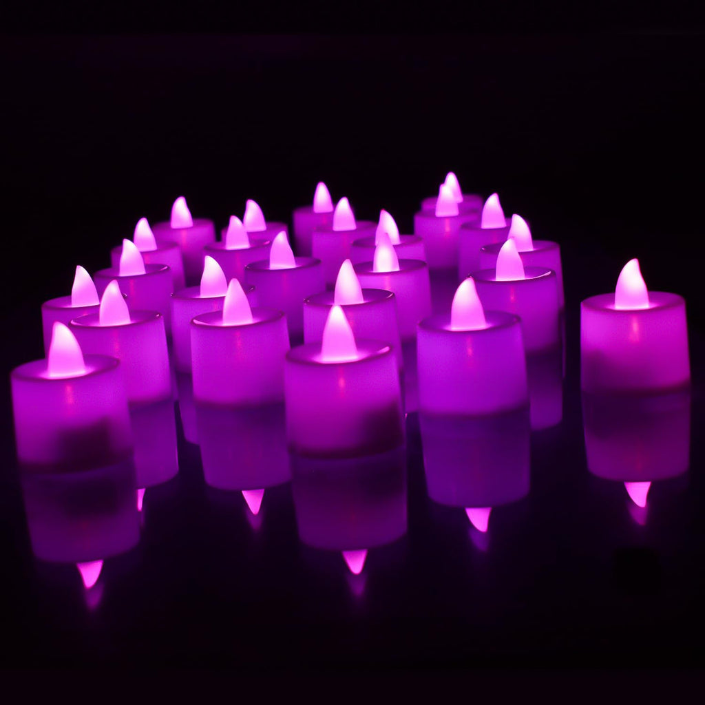 Close-up of a single flameless LED tealight, showing its realistic flicker.