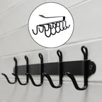 Close-up view of rust-proof iron hooks on the metal cup holder rack.