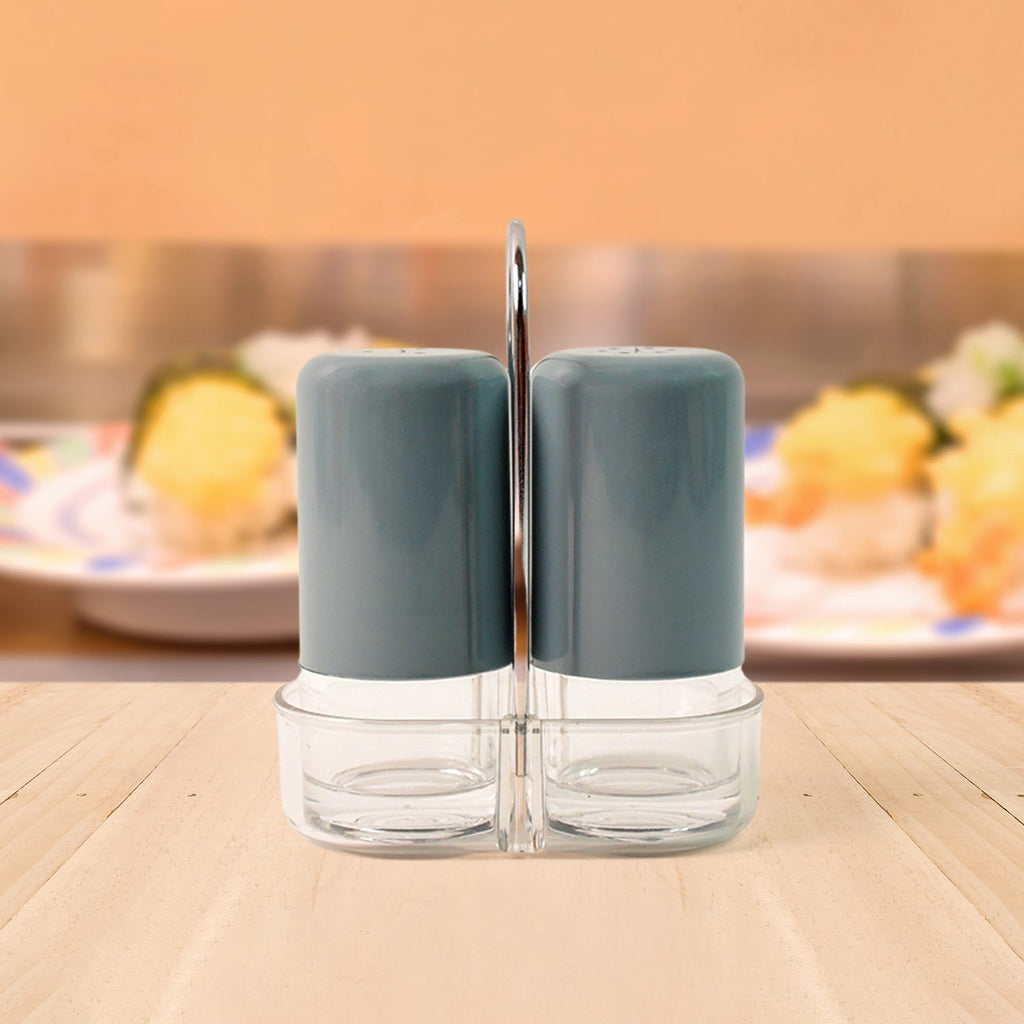 Salt shaker being refilled easily with wide opening for mess-free use
