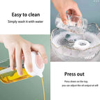 Oil dispenser bottle showcasing the easy-to-use silicone basting brush.