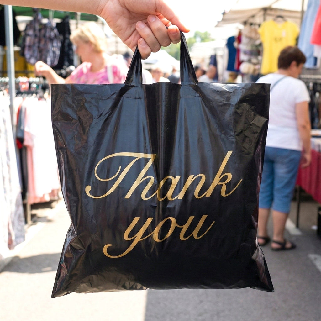 Foldable Thank You printed carry bag showing sturdy handle design