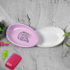 Top view of the slotted layer of the double layer soap holder, designed for quick drying.