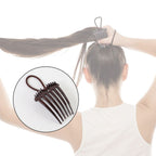 Side view of the Ponytail Comb angled to show the secure elastic loop and comb teeth.
