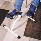 Pedal exerciser for leg and arm workouts with anti-slip pedals