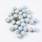 Set of heirloom style white glass marbles with colorful swirls