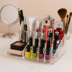 Makeup brushes and lipsticks neatly arranged in acrylic storage compartments