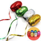 Close-up of a hand curling a balloon ribbon, showing its decorative effect.